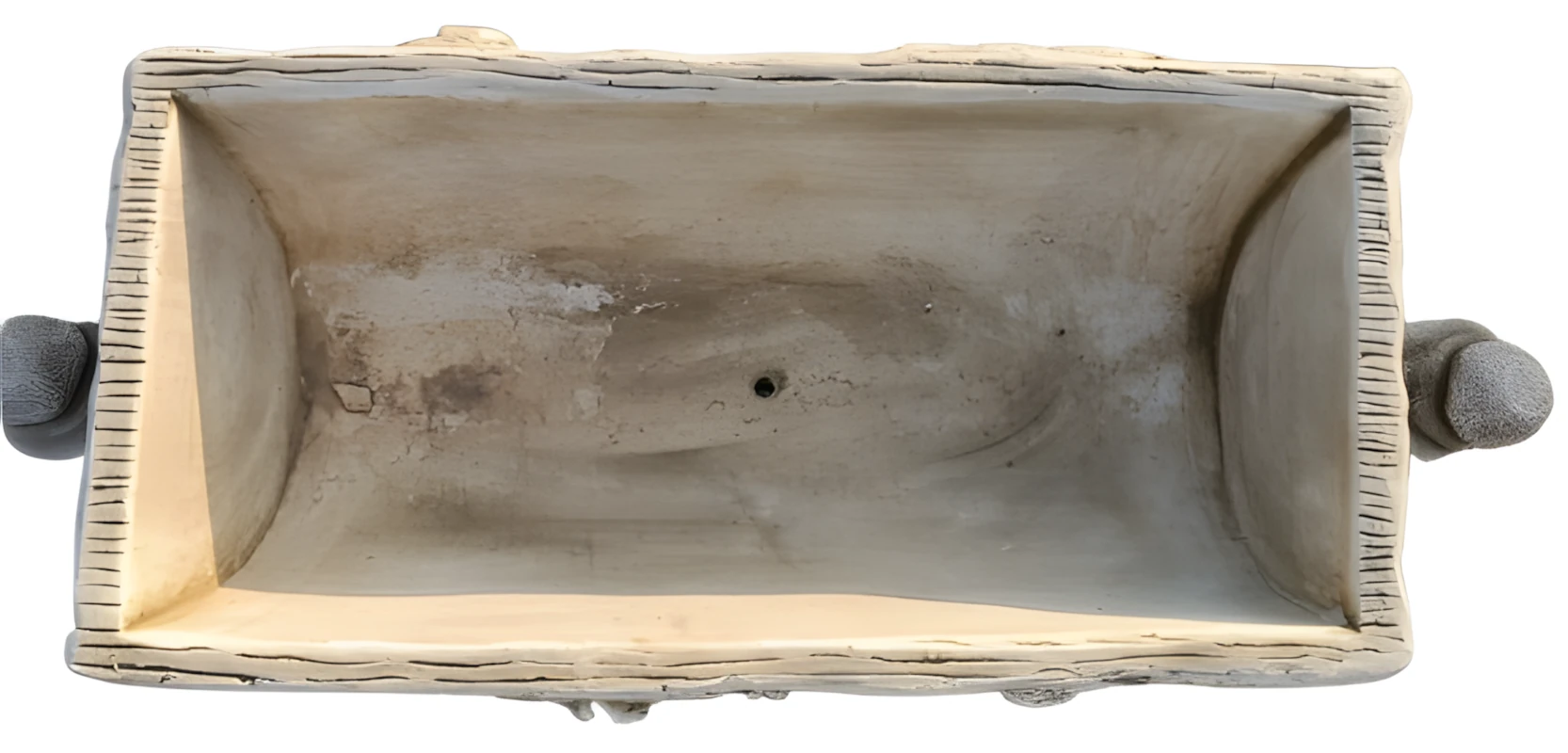 0610000065_8 Vista superior del vaso rectangular de piedra artificial imitación madera para jardinera mostrando la profundidad del contenedor y el orificio de drenaje.