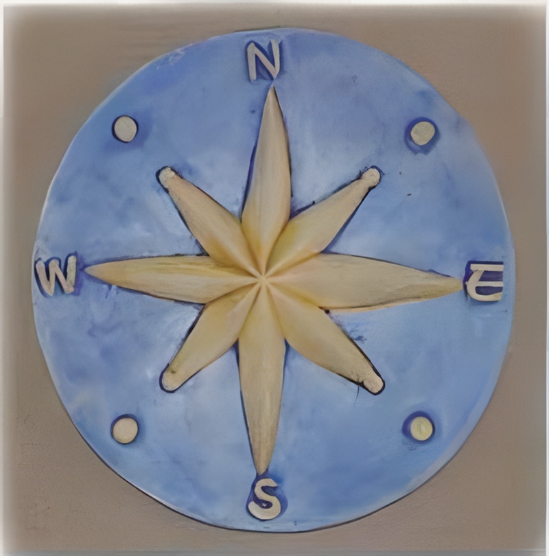 09050100074 Mural circular decorativo en relieve modelo Cuadro Rumbo fabricado en piedra artificial con motivos marineros para pared.